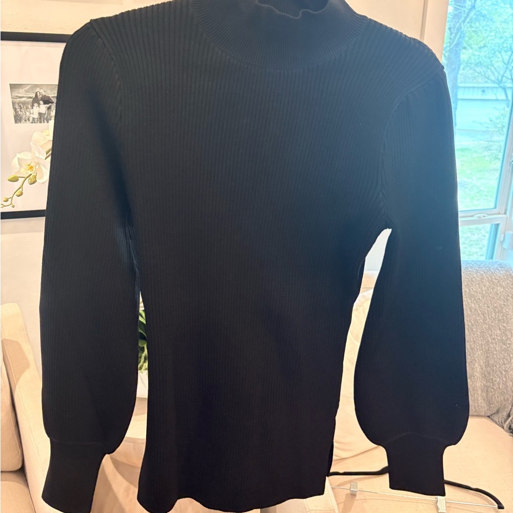 Hill House black ribbed mock-neck sweater with puff sleeves
